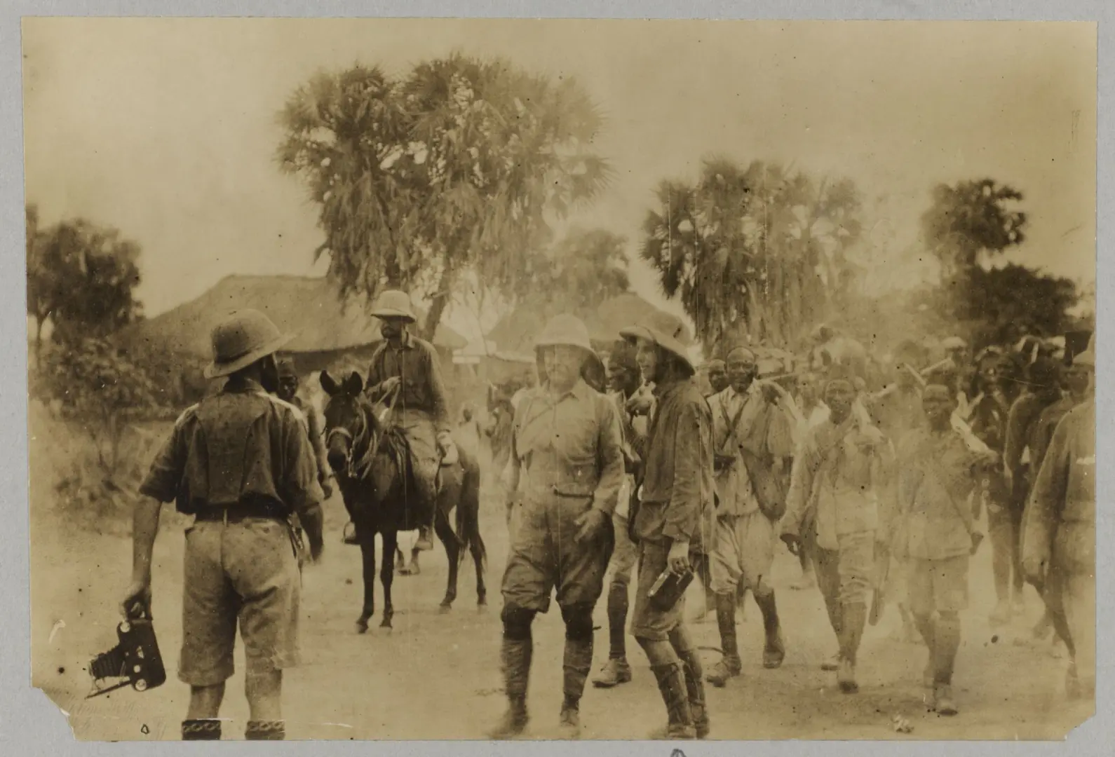 Photograph of Theodore Roosevelt and Kermit Roosevelt with others in Africa